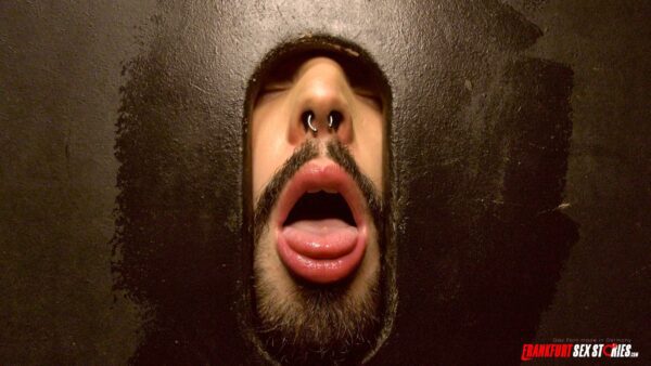 Bearded guy waiting with opened mouth at the glory hole